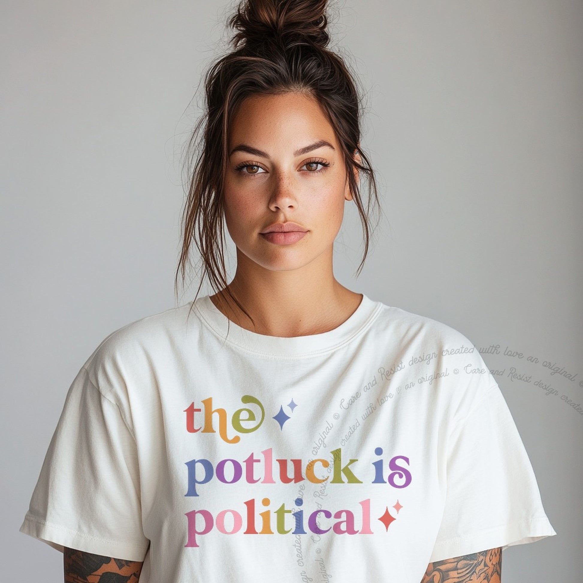 The Potluck is Political Care & Resist rainbow tee