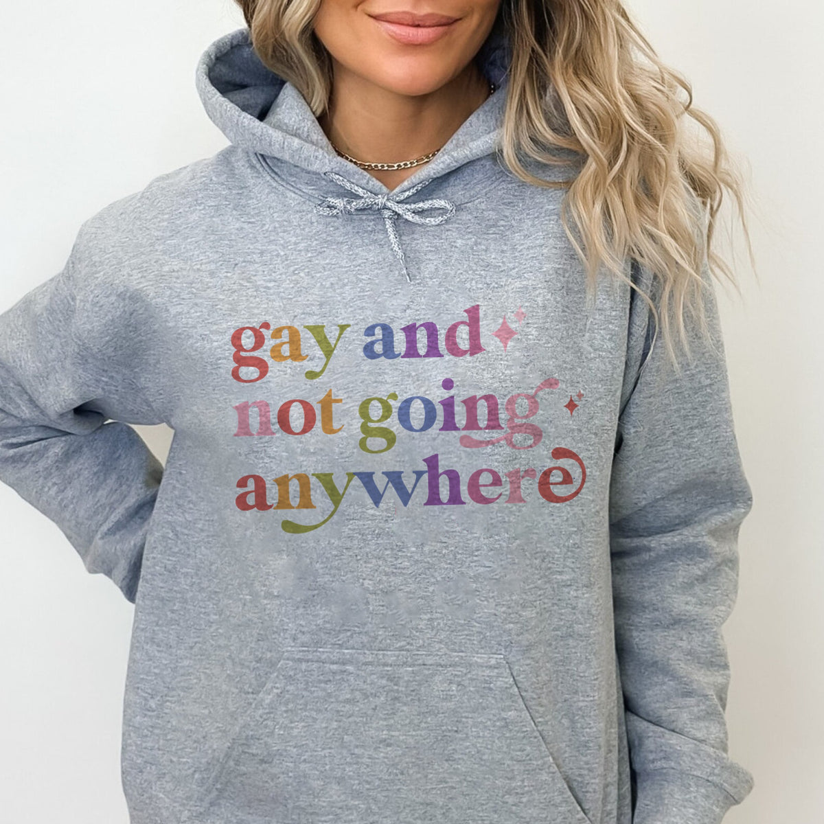 Gay and not Going Anywhere Care & Resist Gildan hoodie in Sport Grey