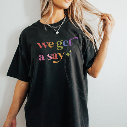 We Get a Say Care & Resist rainbow Comfort Colors tee, Black
