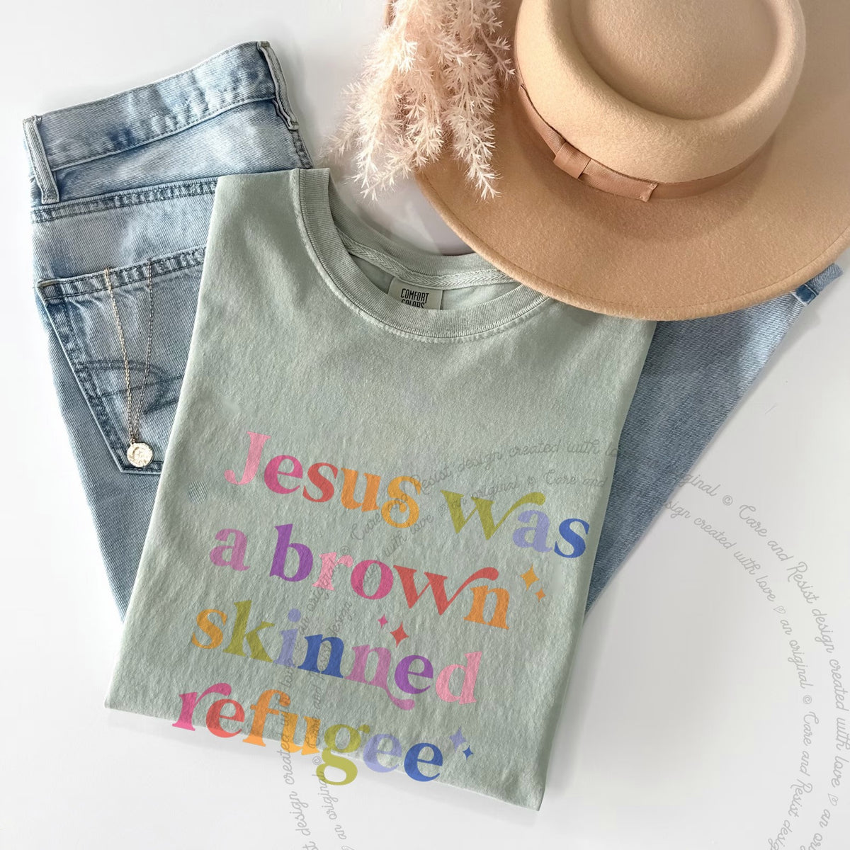 Jesus Was a Brown Skinned Refugee Care & Resist progressive t-shirt in Bay