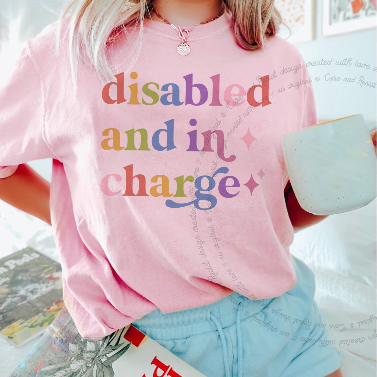 Disabled and in Charge Care & Resist rainbow tee