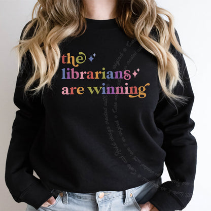 The Librarians are Winning Care & Resist Gildan crewneck sweatshirt in Black