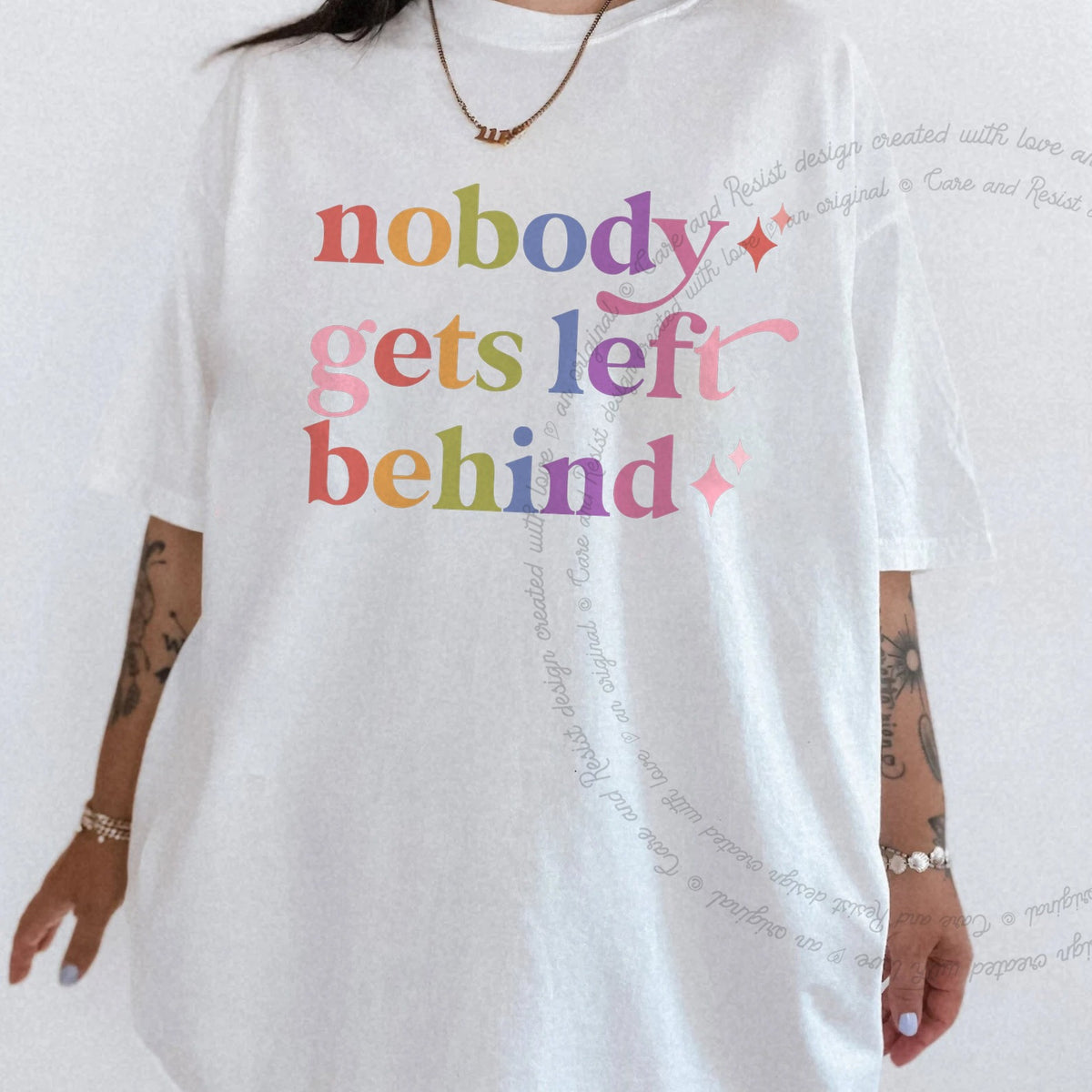 Nobody Gets Left Behind Care & Resist rainbow tee