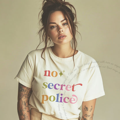 No Secret Police Care & Resist rainbow Comfort Colors tee, Ivory