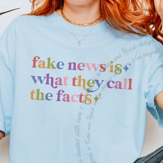 Fake News is What They Call the Facts Care & Resist progressive t-shirt in Chambray
