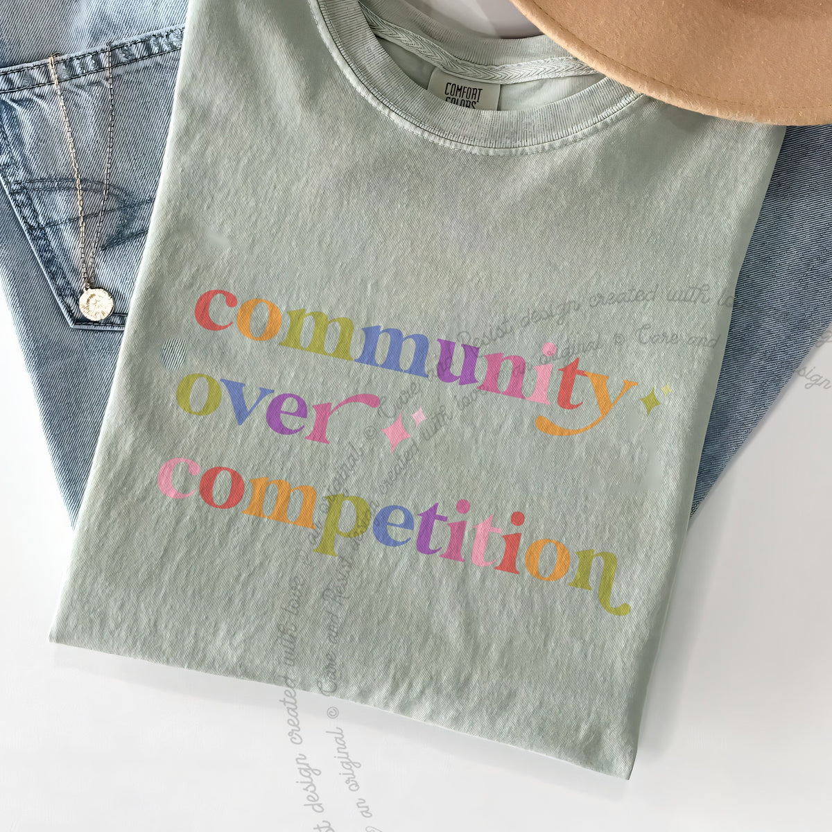 Community Over Competition Care & Resist progressive t-shirt in Bay
