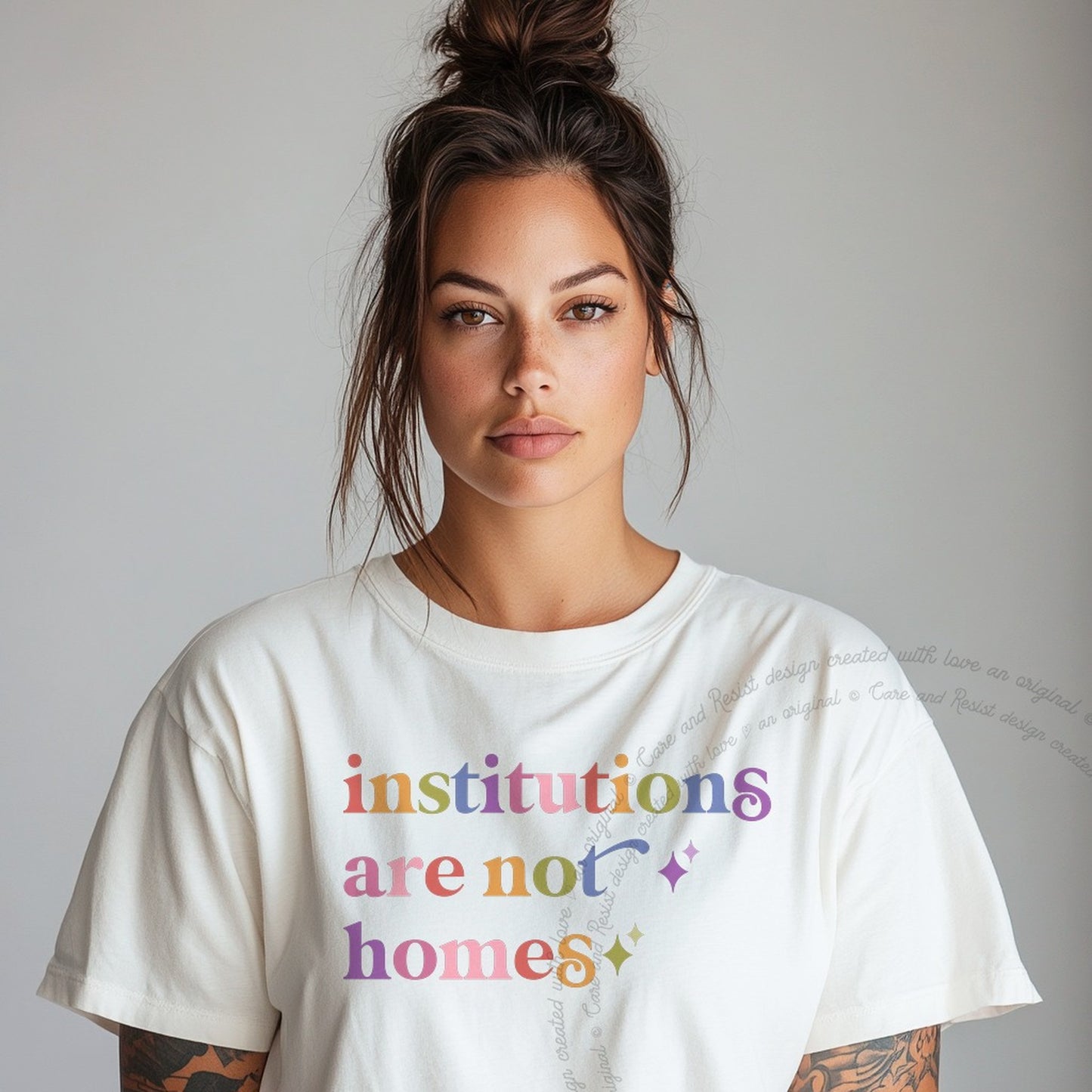 Institutions are not Homes Care & Resist rainbow tee