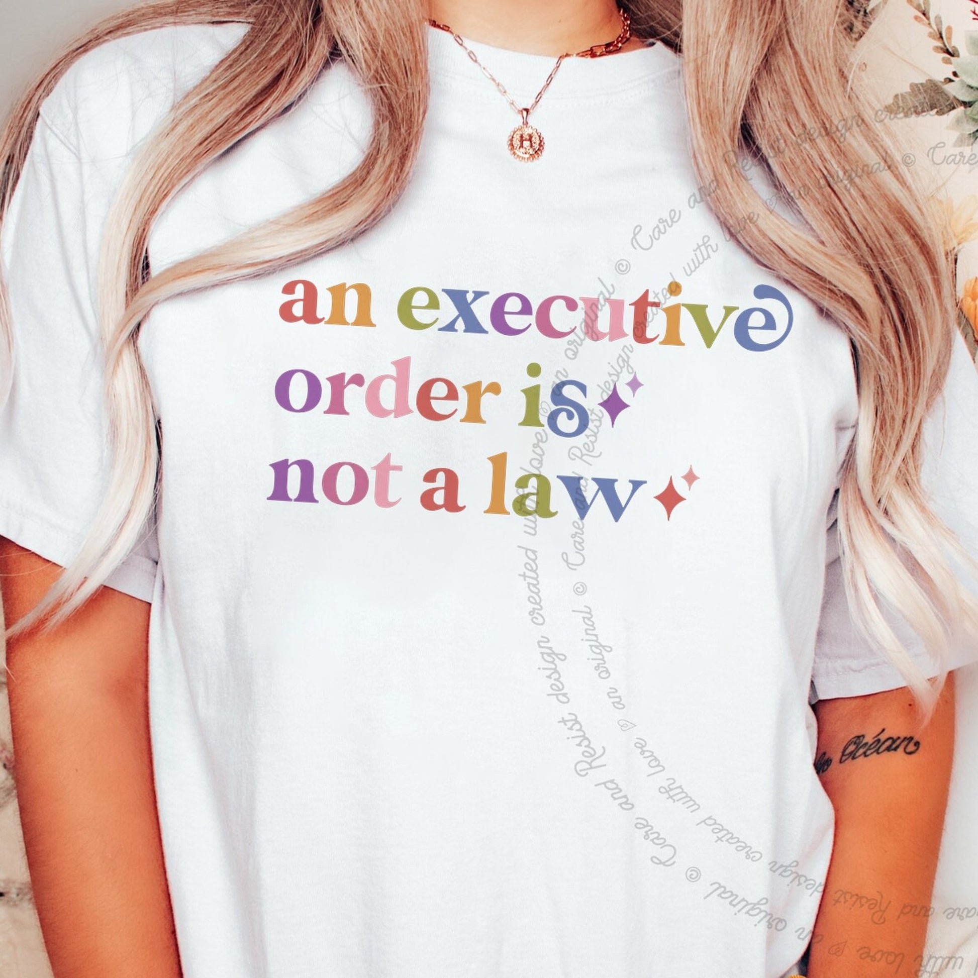 An Executive Order is not a Law Care & Resist rainbow tee