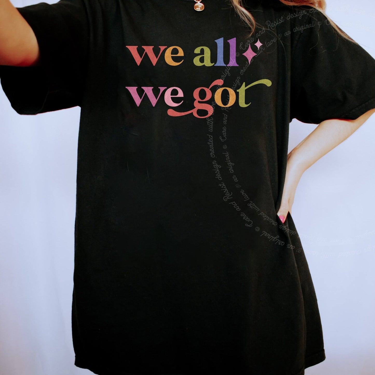 We All We Got Care & Resist rainbow Comfort Colors tee, Black
