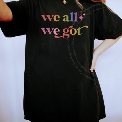 We All We Got Care & Resist rainbow Comfort Colors tee, Black
