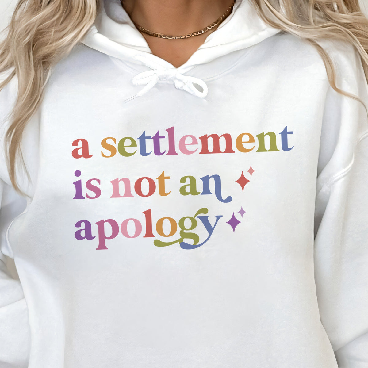 A Settlement is not an Apology Care & Resist Gildan hoodie in White