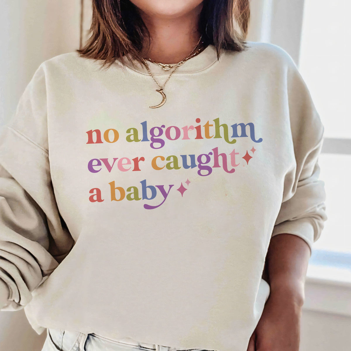 No Algorithm Ever Caught a Baby Care & Resist Gildan crewneck sweatshirt in Sand