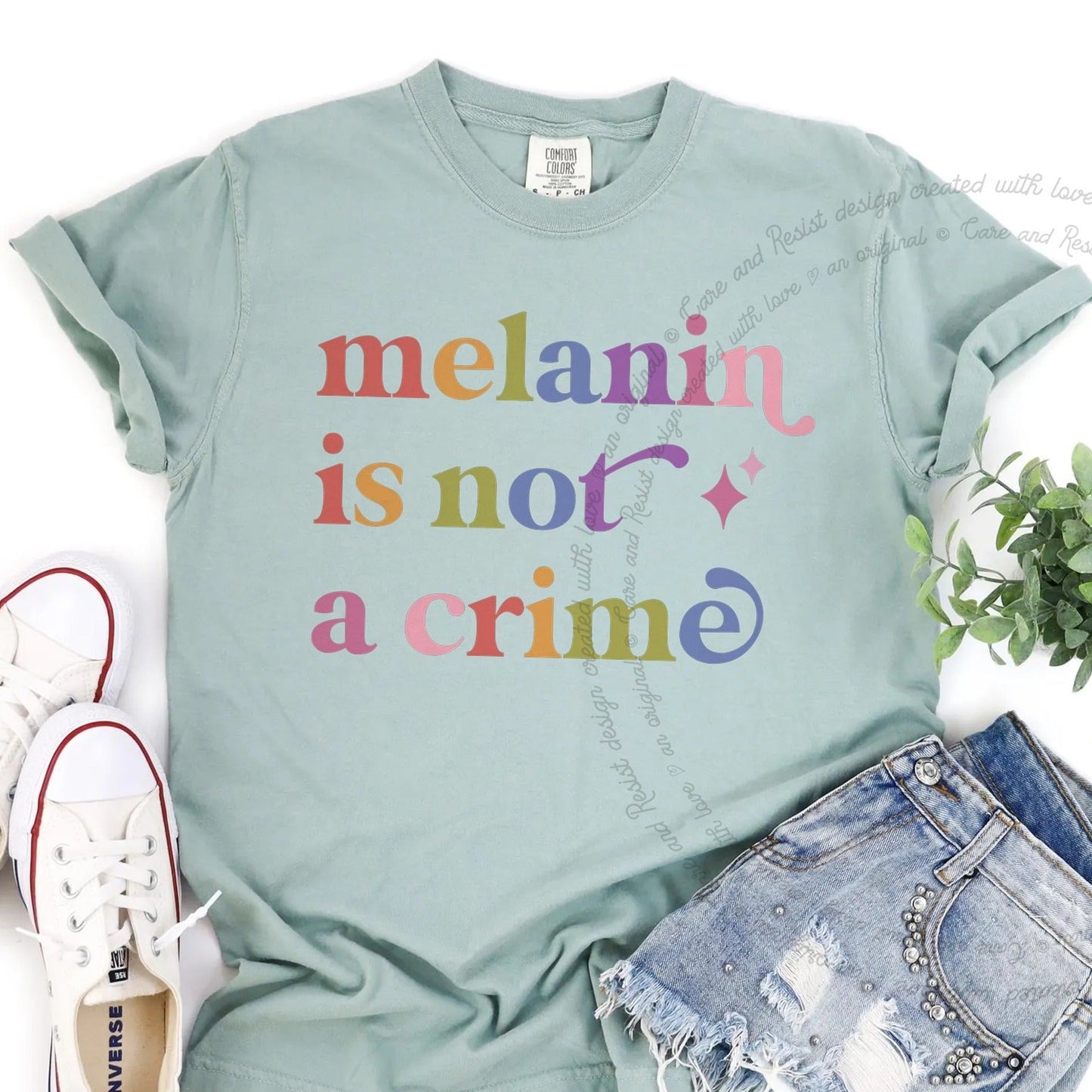 Melanin is not a Crime Care & Resist rainbow Comfort Colors tee, Bay