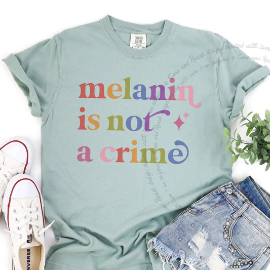 Melanin is not a Crime Care & Resist rainbow Comfort Colors tee, Bay