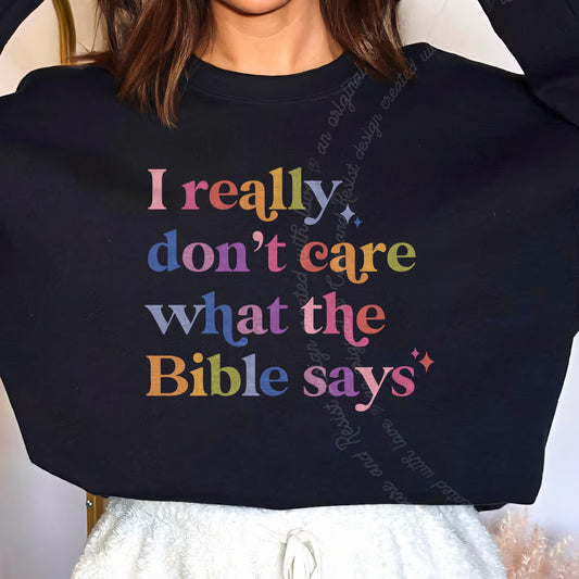 I Really Don't Care What the Bible Says Care & Resist Gildan crewneck sweatshirt in Black