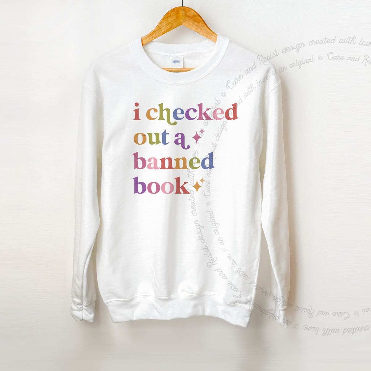 I Checked Out a Banned Book Care & Resist Gildan crewneck sweatshirt in White