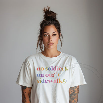 No Soldiers on Our Sidewalks Care & Resist rainbow tee