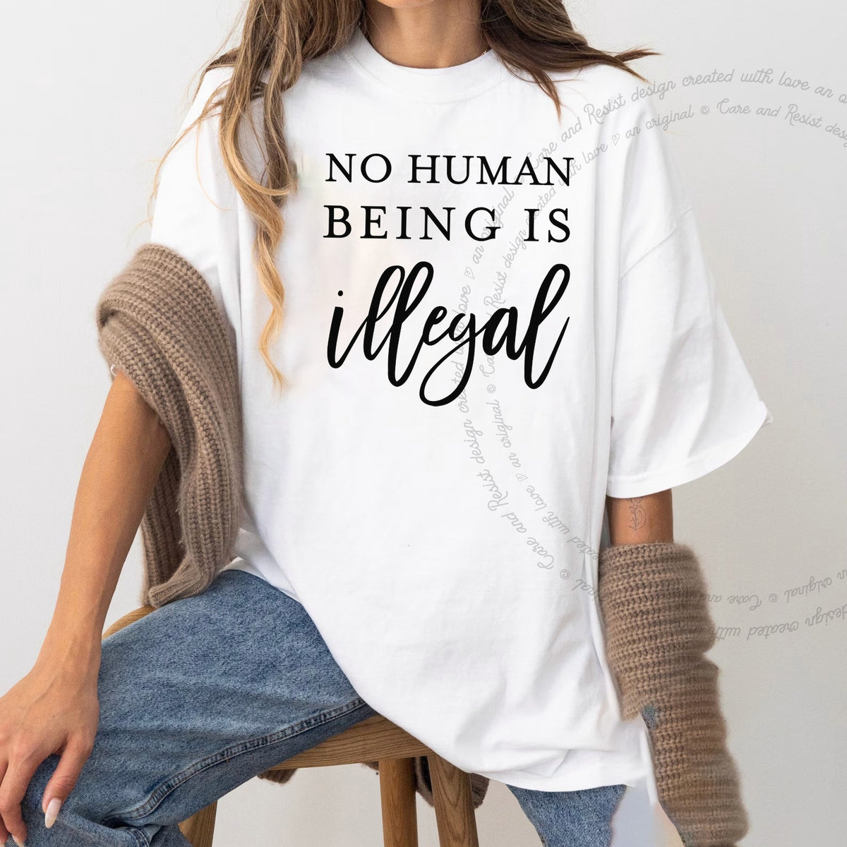 No Human Being Is Illegal Care & Resist progressive t-shirt in White