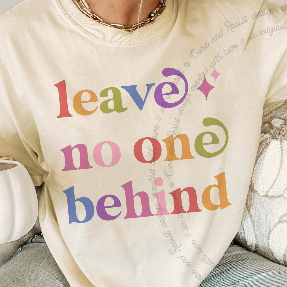 Leave No One Behind Care & Resist progressive t-shirt in Ivory