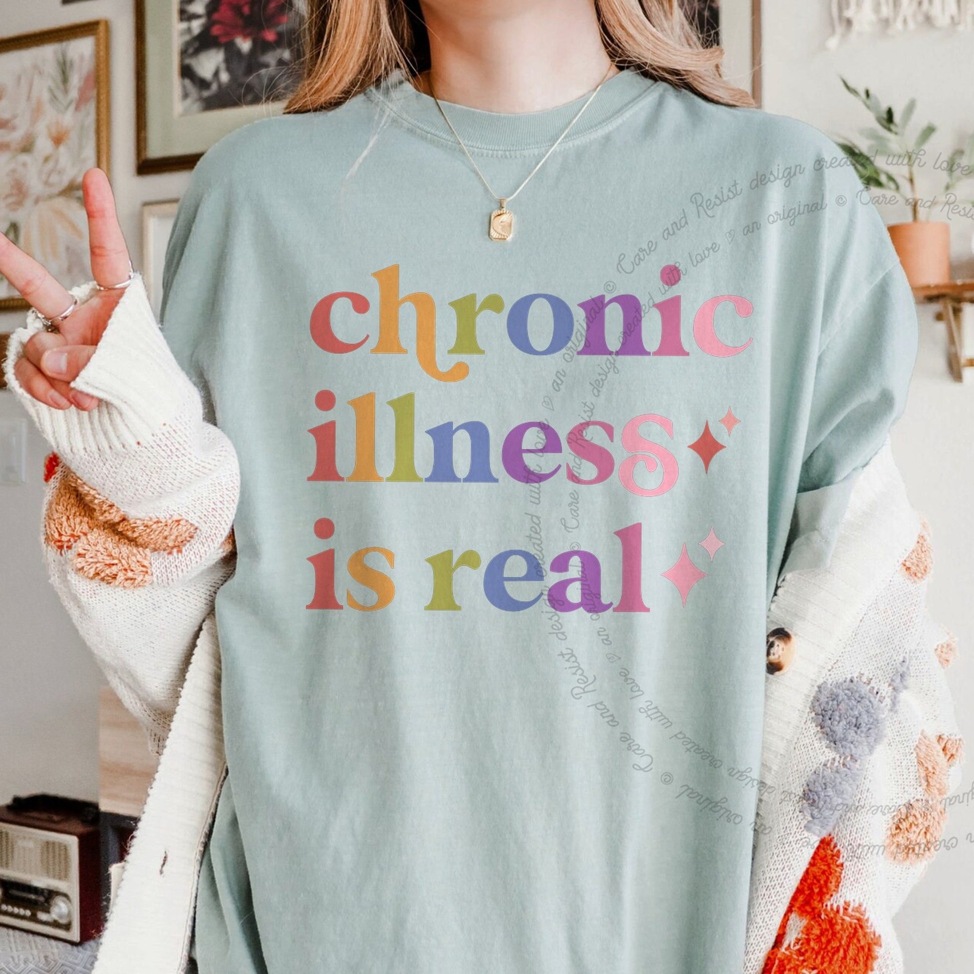 Chronic Illness is Real Care & Resist rainbow Comfort Colors tee, Bay