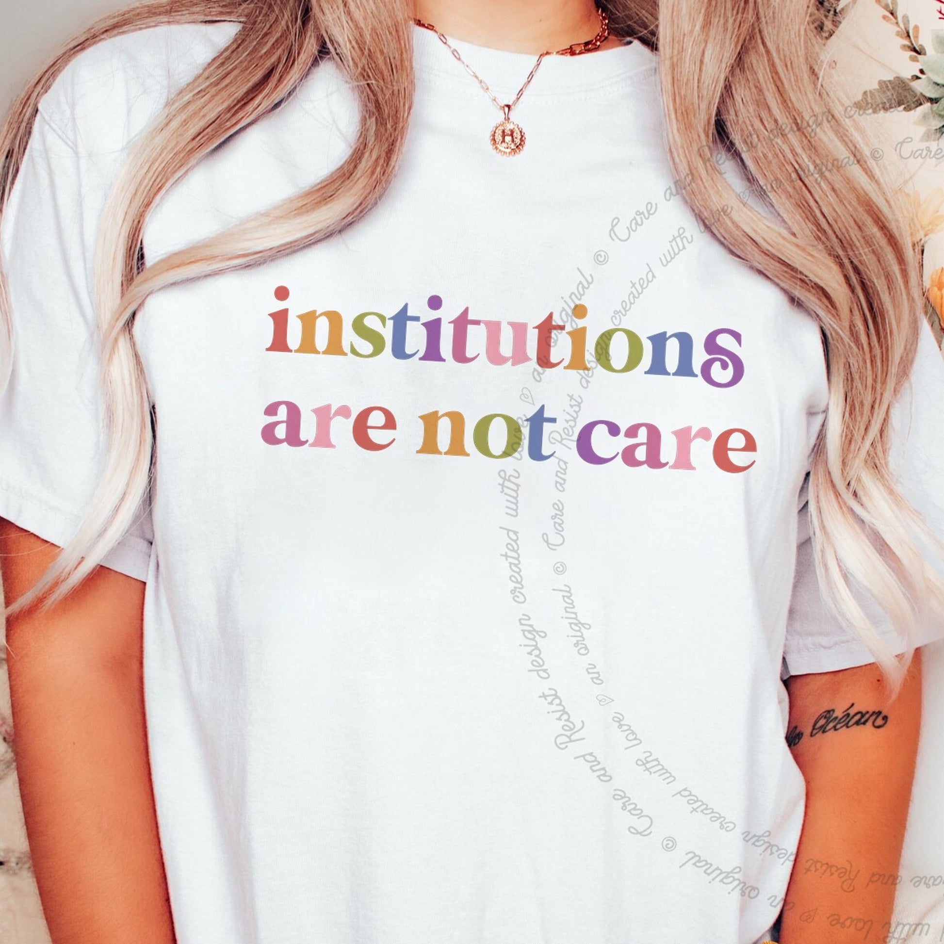 Institutions are not Care Care & Resist rainbow Comfort Colors tee, White