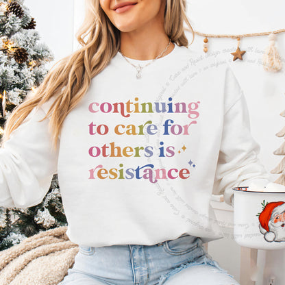 Continuing to Care for Others Is Resistance Care & Resist Gildan crewneck sweatshirt in White