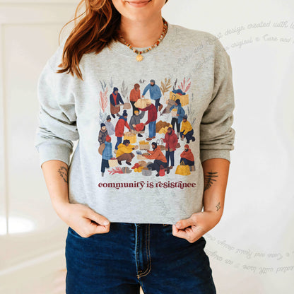 Community is Resistance Retro People Care & Resist Gildan crewneck sweatshirt in Sport Grey
