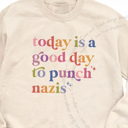 Today Is a Good Day to Punch Nazis Care & Resist Gildan crewneck sweatshirt in Sand