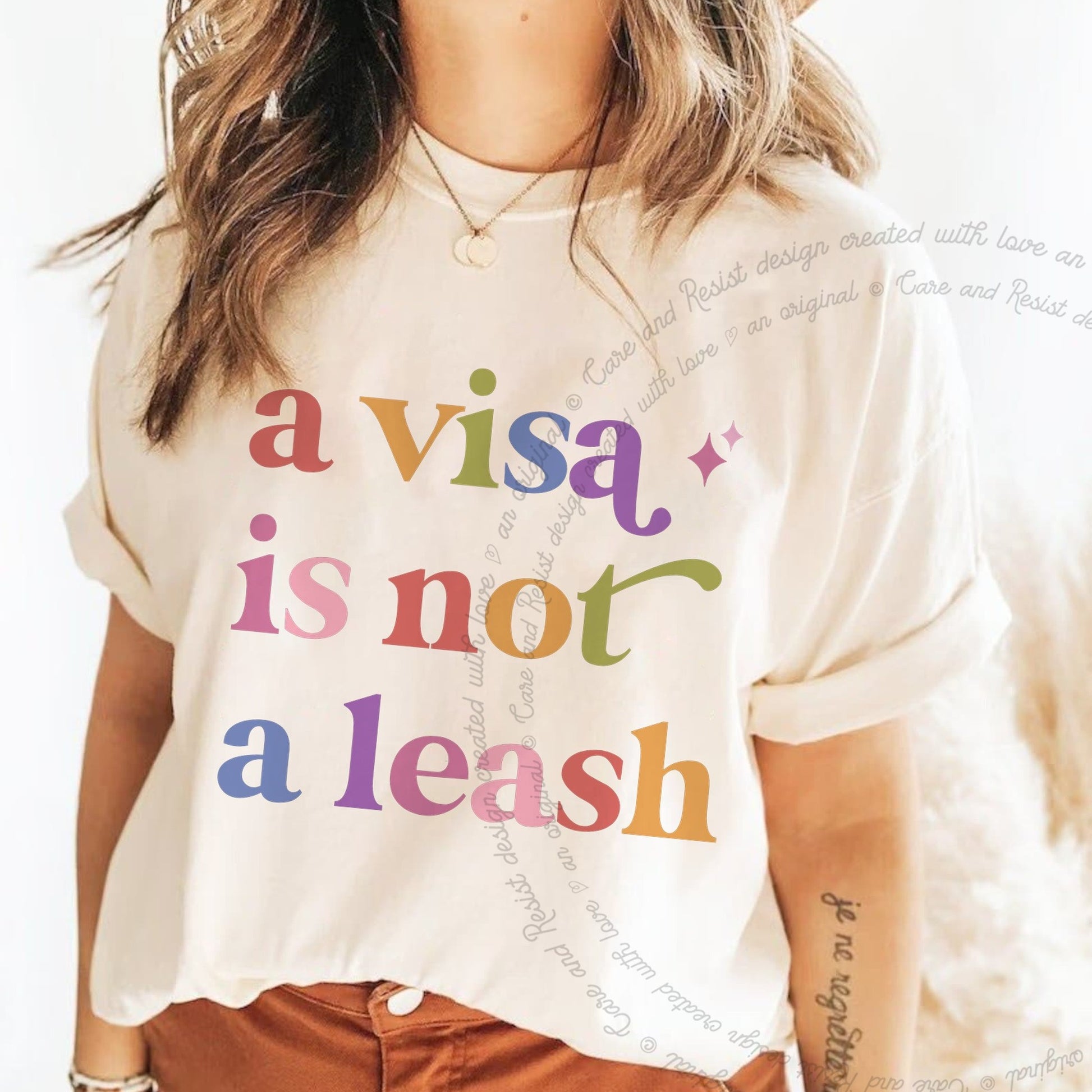 A Visa is not a Leash Care & Resist rainbow Comfort Colors tee, Ivory