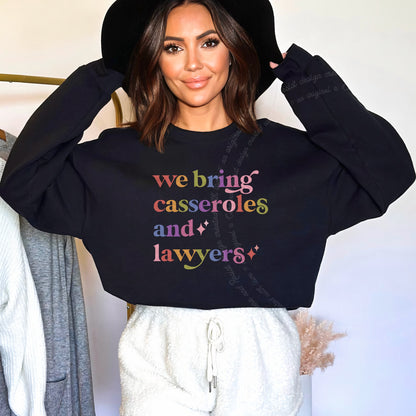 We Bring Casseroles and Lawyers Care & Resist Gildan crewneck sweatshirt in Black