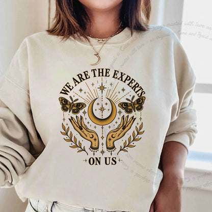 We are the Experts on Us Celestial Care & Resist Gildan crewneck sweatshirt in Sand
