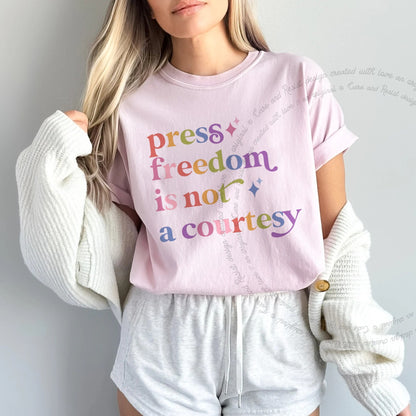Press Freedom is not a Courtesy Care & Resist progressive t-shirt in Blossom