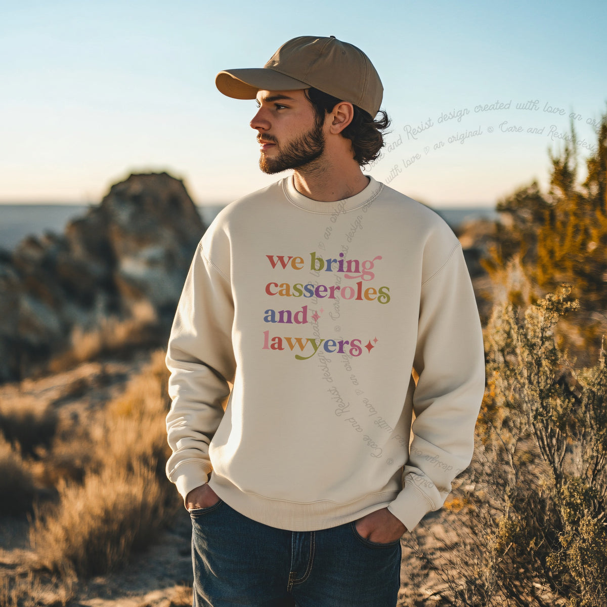 We Bring Casseroles and Lawyers Care & Resist Gildan crewneck sweatshirt in Sand