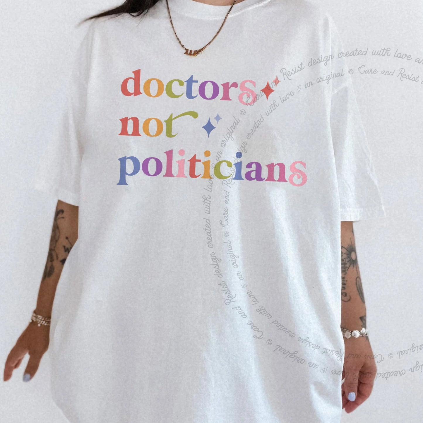 Doctors not Politicians Care & Resist rainbow Comfort Colors tee, White