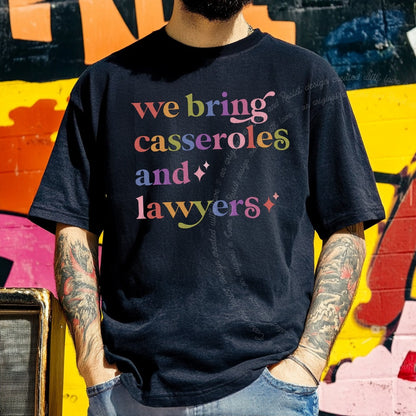 We Bring Casseroles and Lawyers Care & Resist rainbow tee