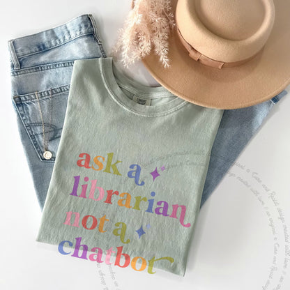Ask a Librarian not a Chatbot Care & Resist rainbow Comfort Colors tee, Bay