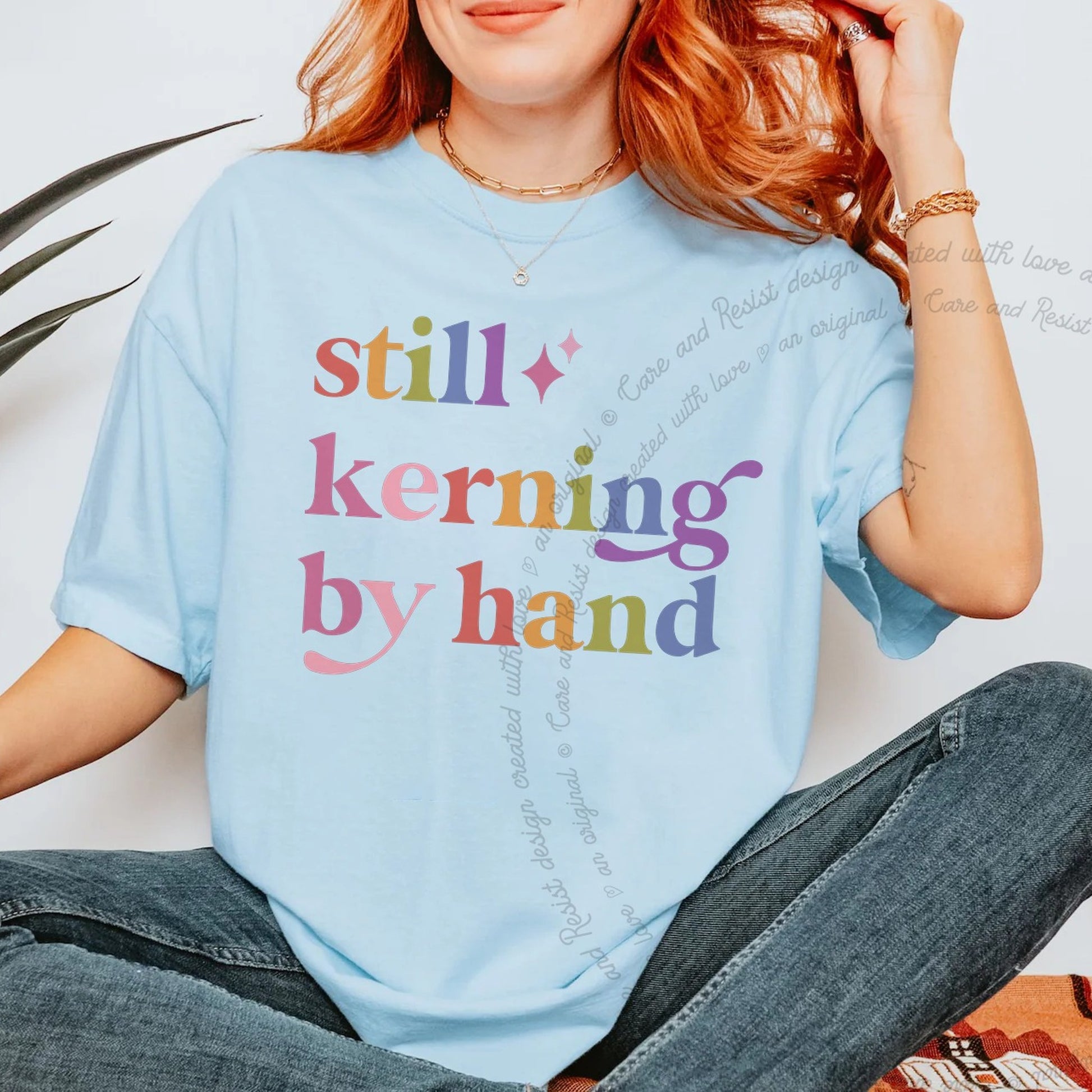 Still Kerning By Hand Care & Resist rainbow Comfort Colors tee, Chambray