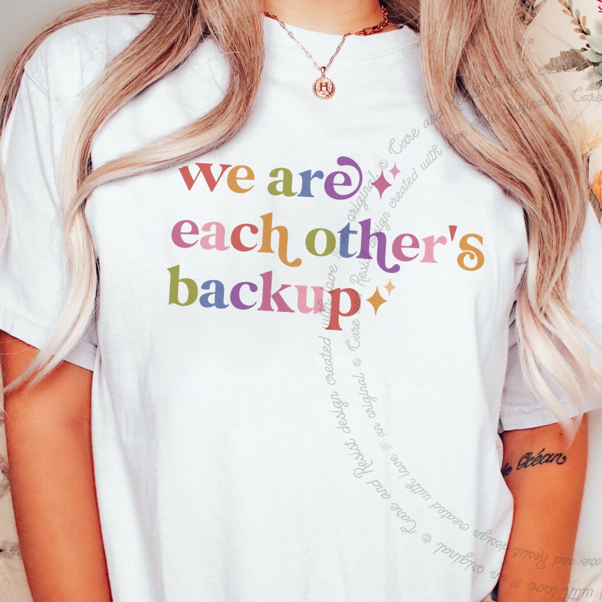 We are Each Other's Backup Care & Resist rainbow tee