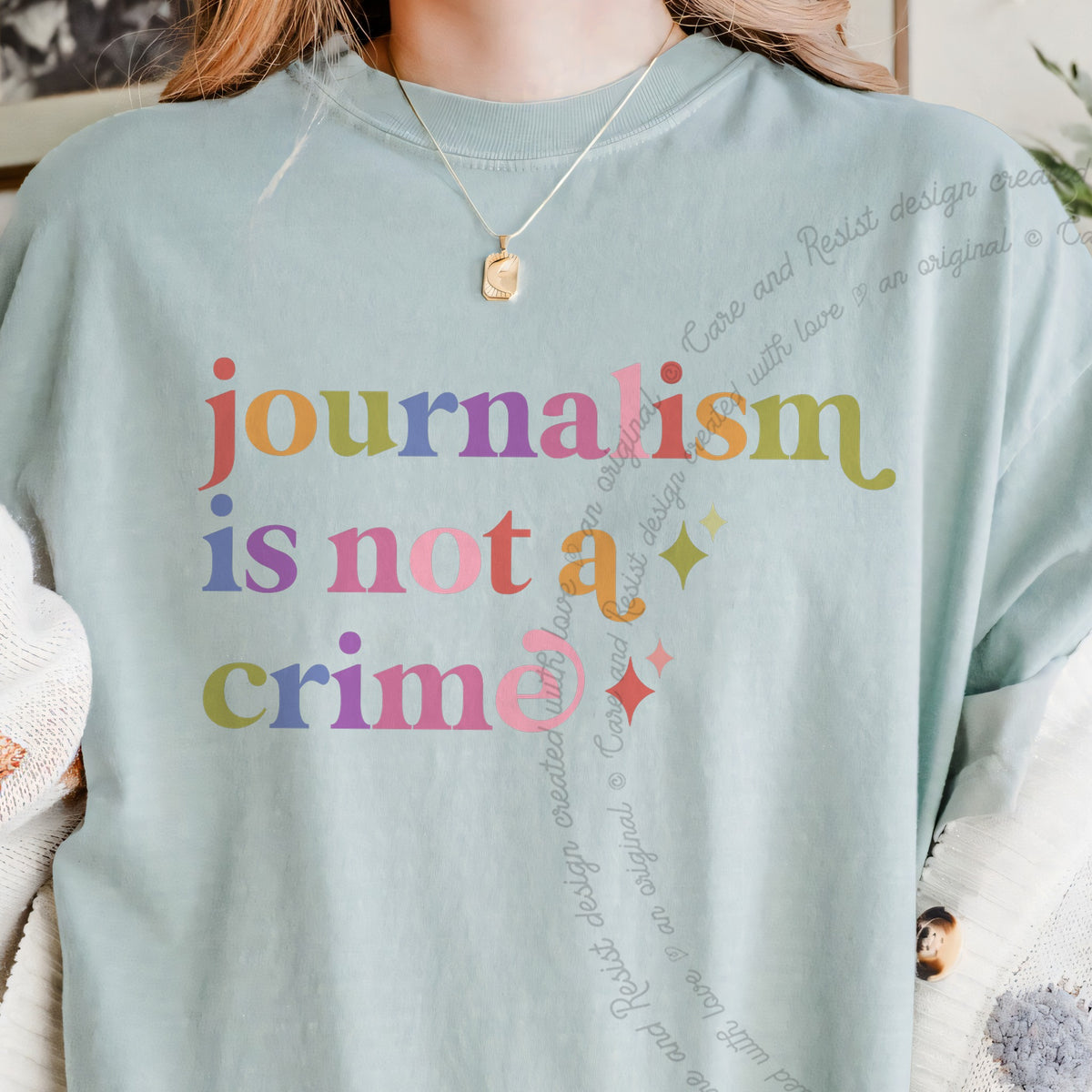 Journalism is not a Crime Care & Resist progressive t-shirt in Bay