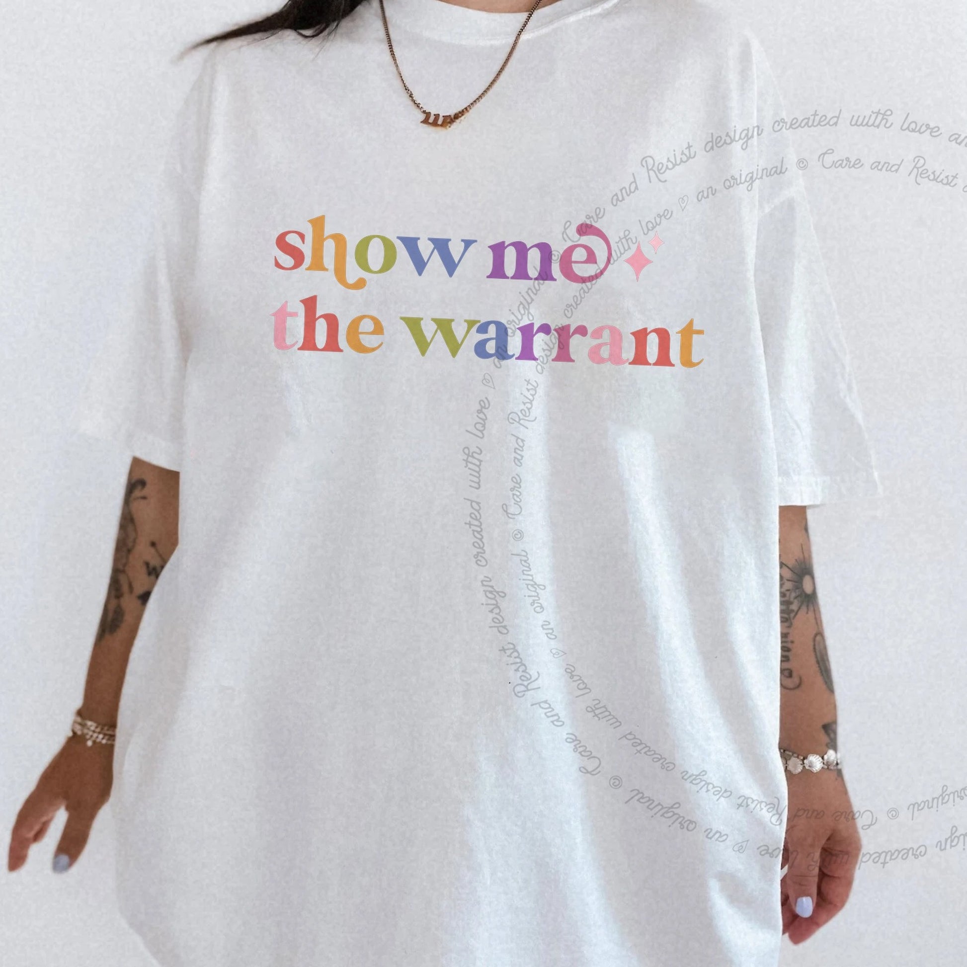 Show Me the Warrant Care & Resist rainbow Comfort Colors tee, White