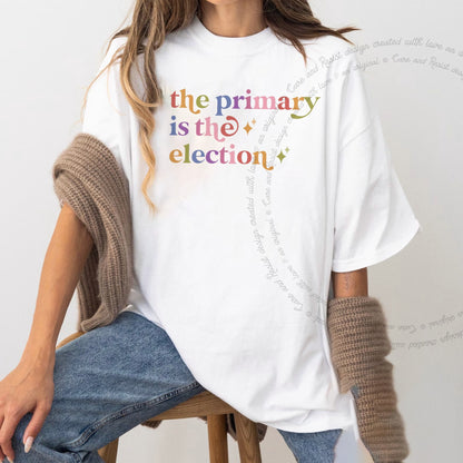 The Primary is the Election Care & Resist rainbow Comfort Colors tee, White