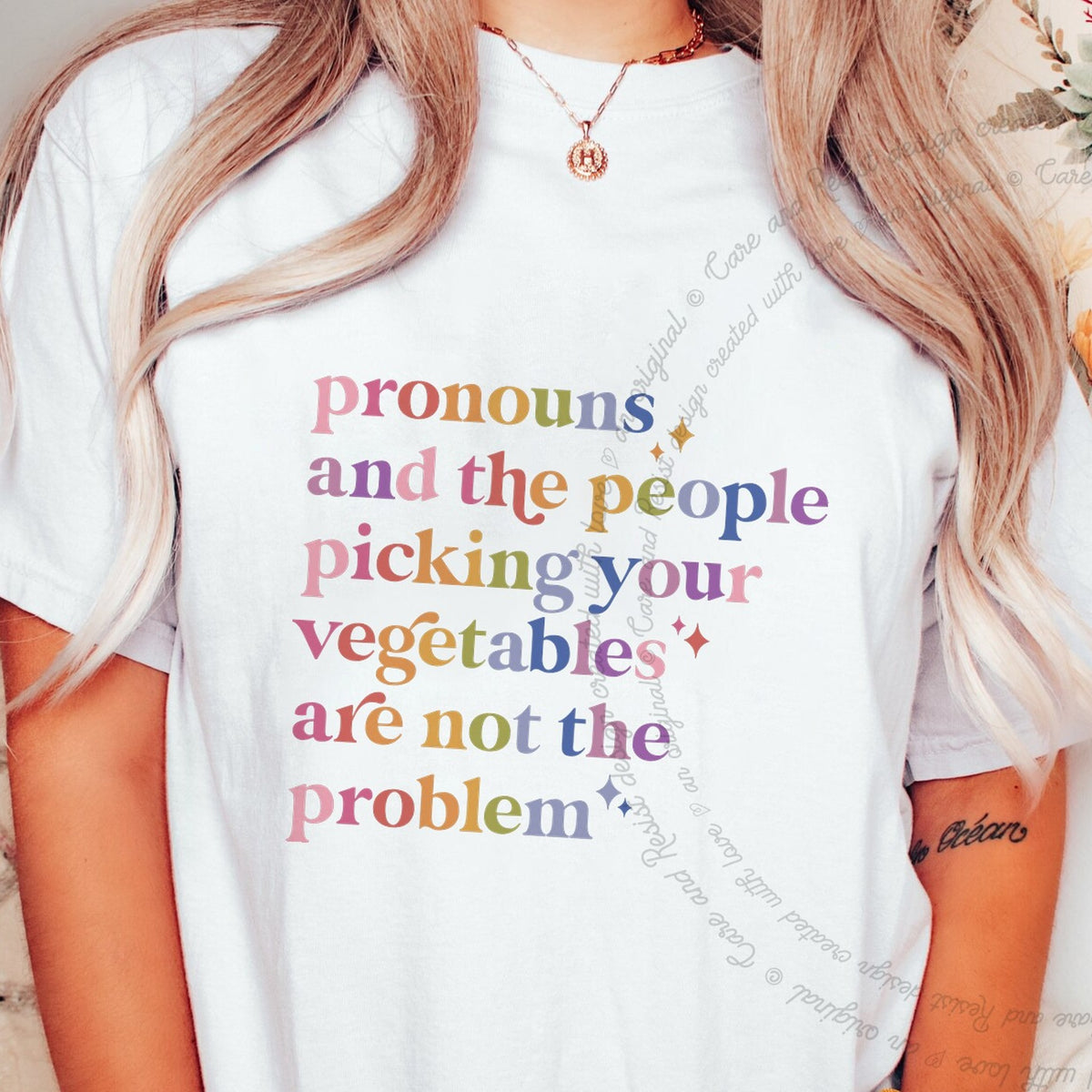 Pronouns and the People Picking Your Vegetables Are Not the Problem Care & Resist progressive t-shirt in White