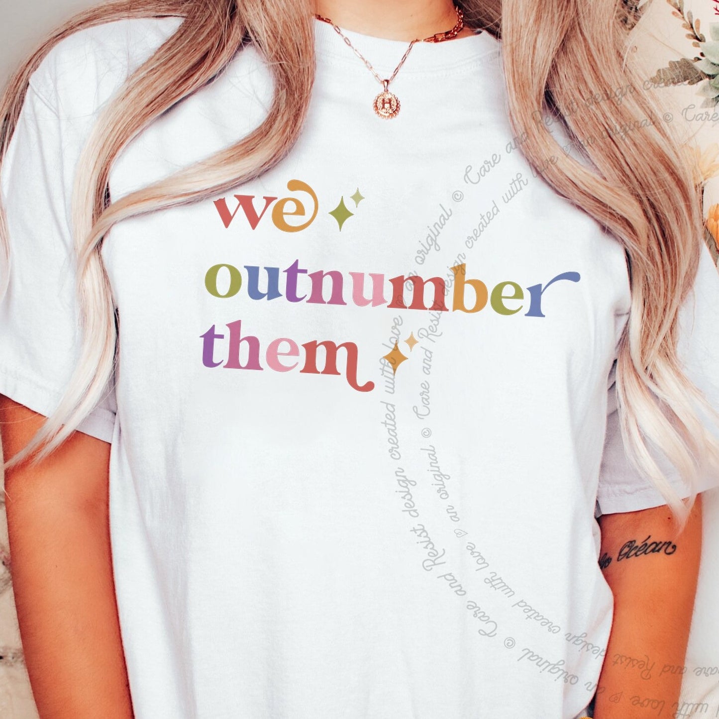We Outnumber Them Care & Resist rainbow Comfort Colors tee, White