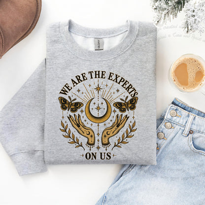 We are the Experts on Us Celestial Care & Resist Gildan crewneck sweatshirt in Sport Grey