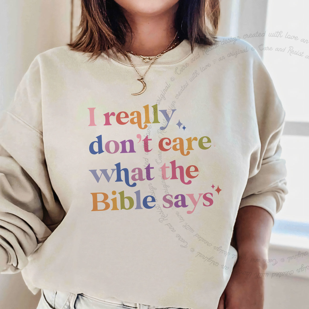 I Really Don't Care What the Bible Says Care & Resist Gildan crewneck sweatshirt in Sand