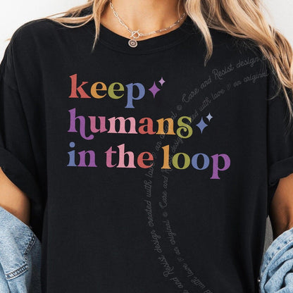 Keep Humans in the Loop Care & Resist rainbow Comfort Colors tee, Black