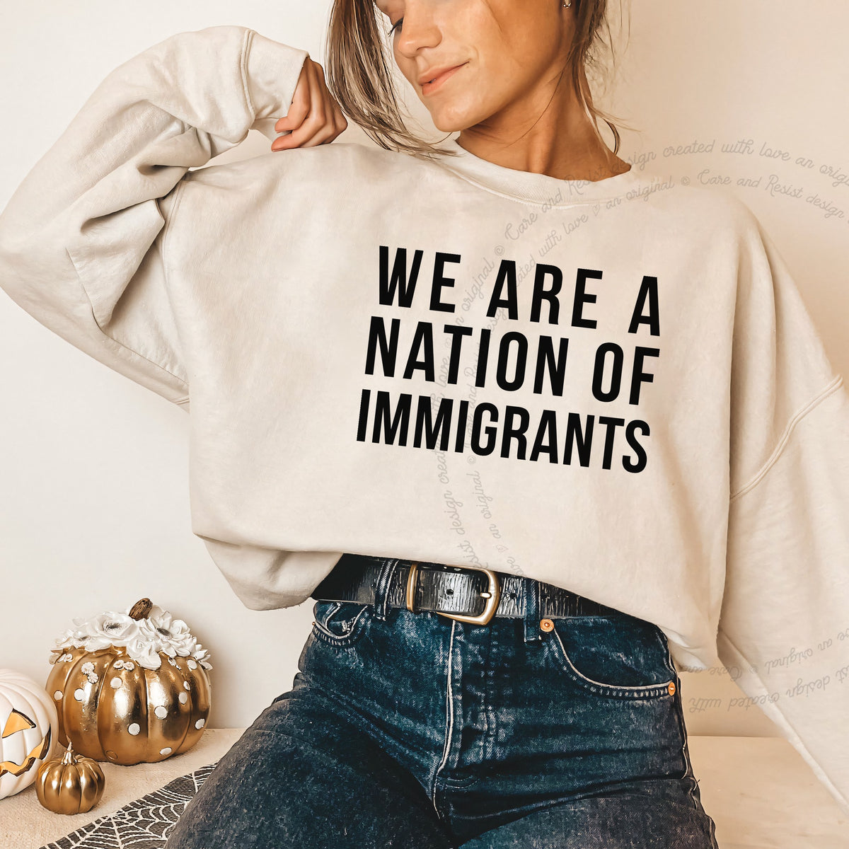 We Are a Nation of Immigrants Care & Resist Gildan crewneck sweatshirt in Sand