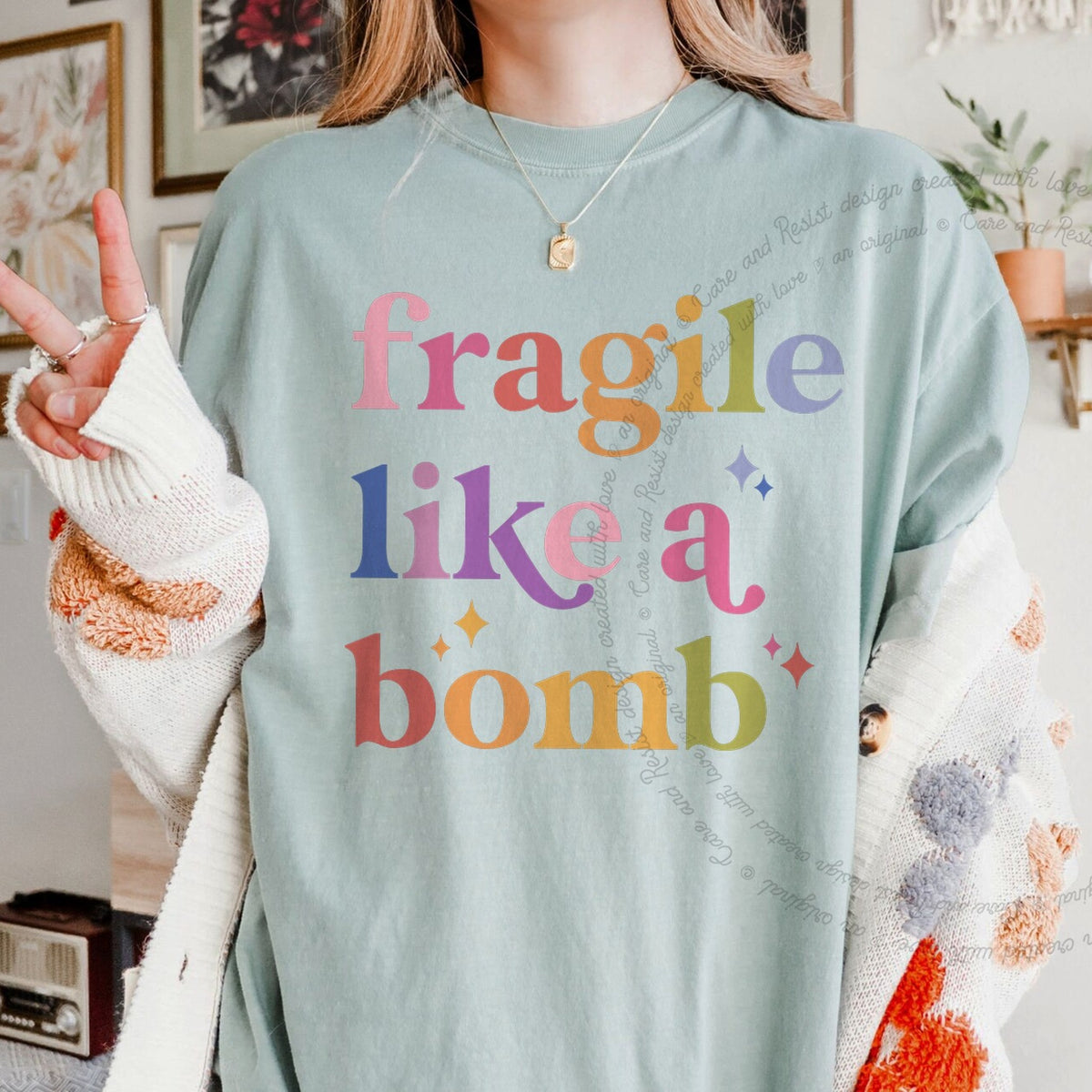 Fragile Like a Bomb Care & Resist progressive t-shirt in Bay
