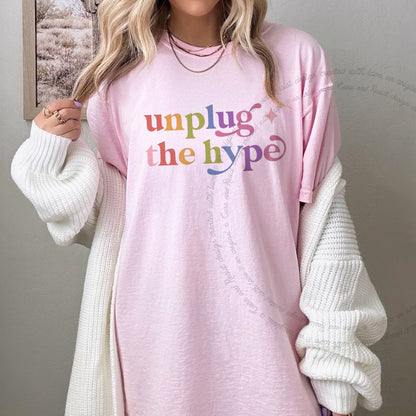 Unplug the Hype Care & Resist rainbow tee
