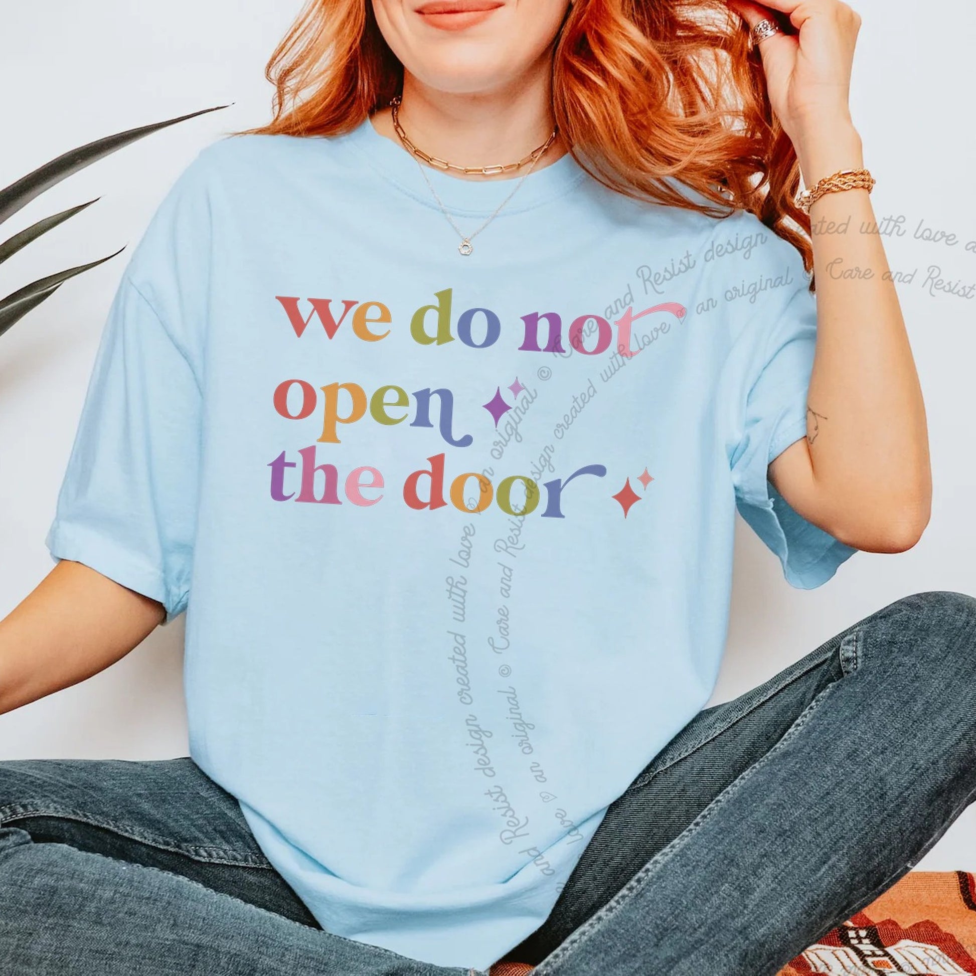 We Do not Open the Door Care & Resist rainbow tee